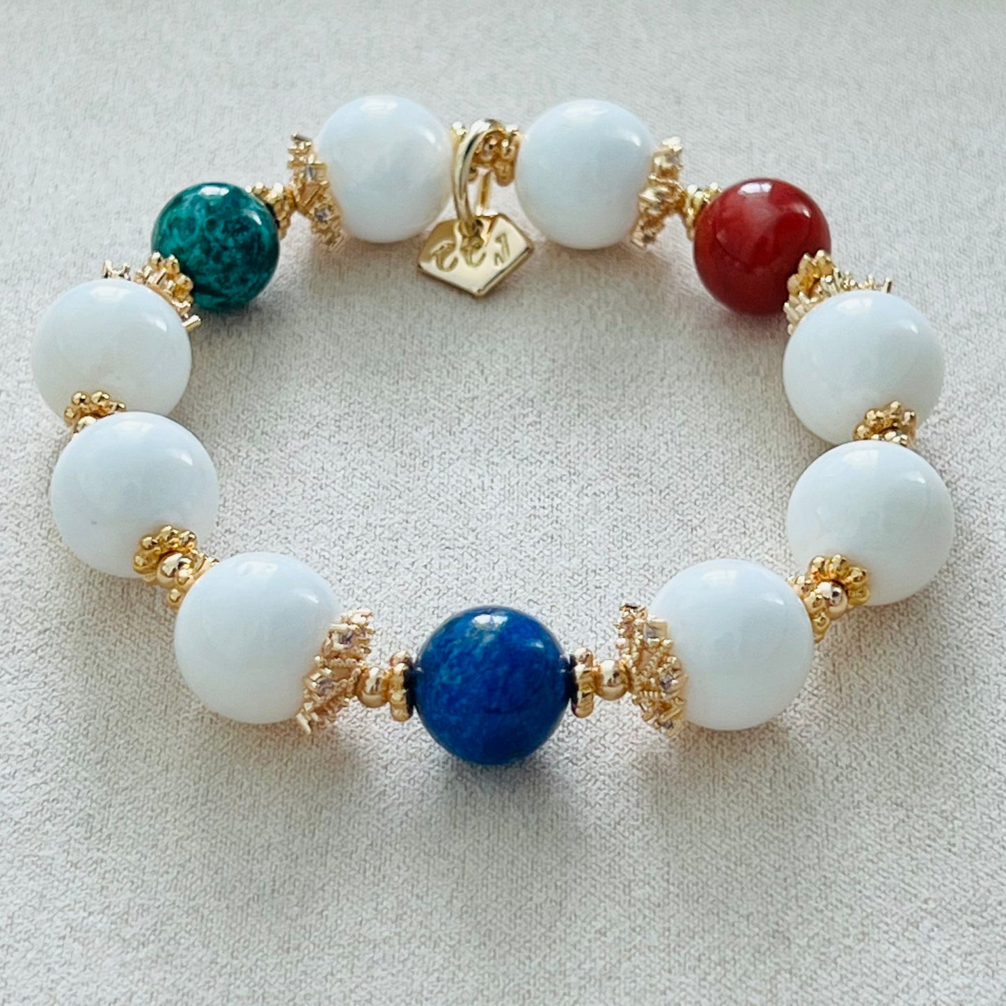 White Coral, Green Turquoise, Lapis Lazuli & Red Agate Bracelet