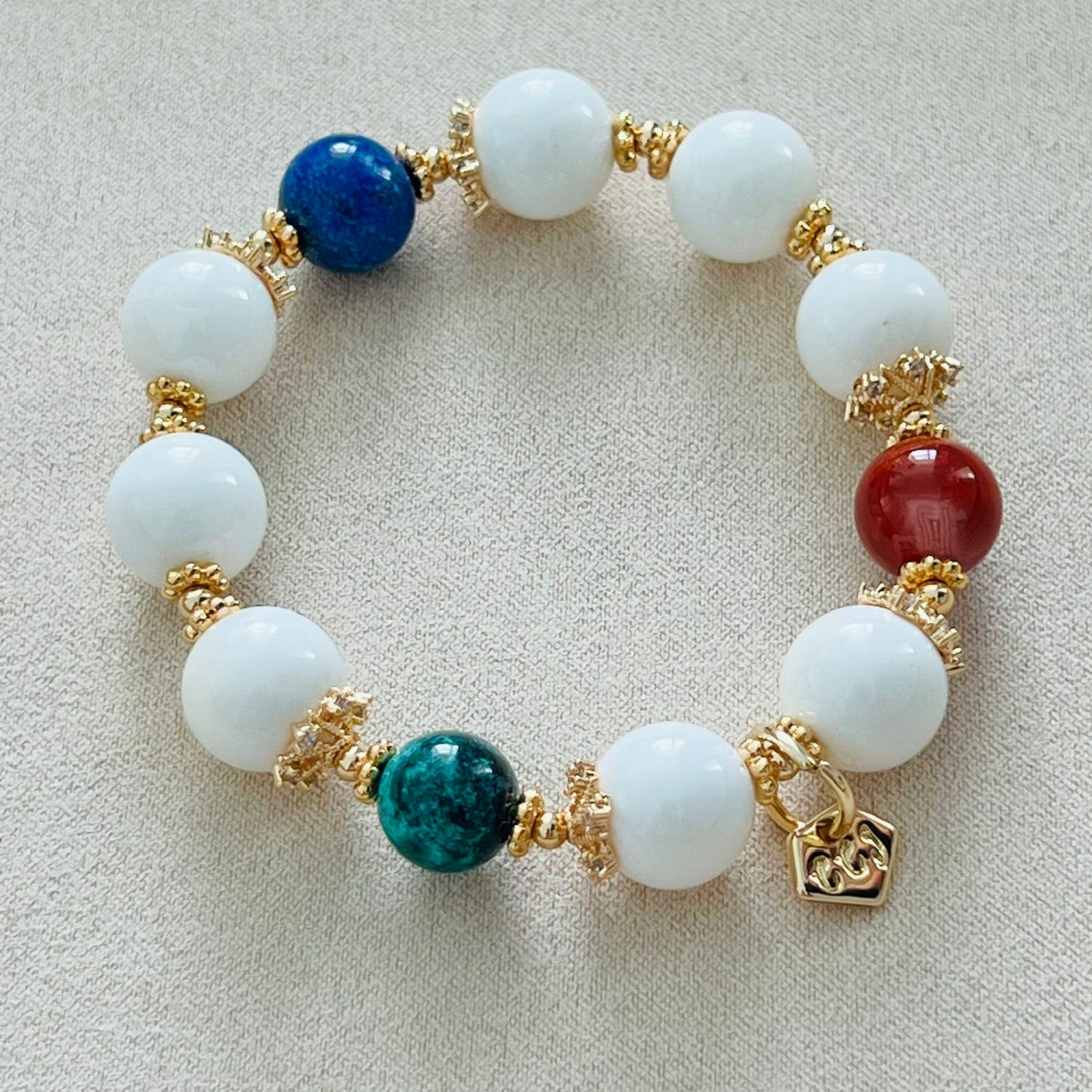 White Coral, Green Turquoise, Lapis Lazuli & Red Agate Bracelet